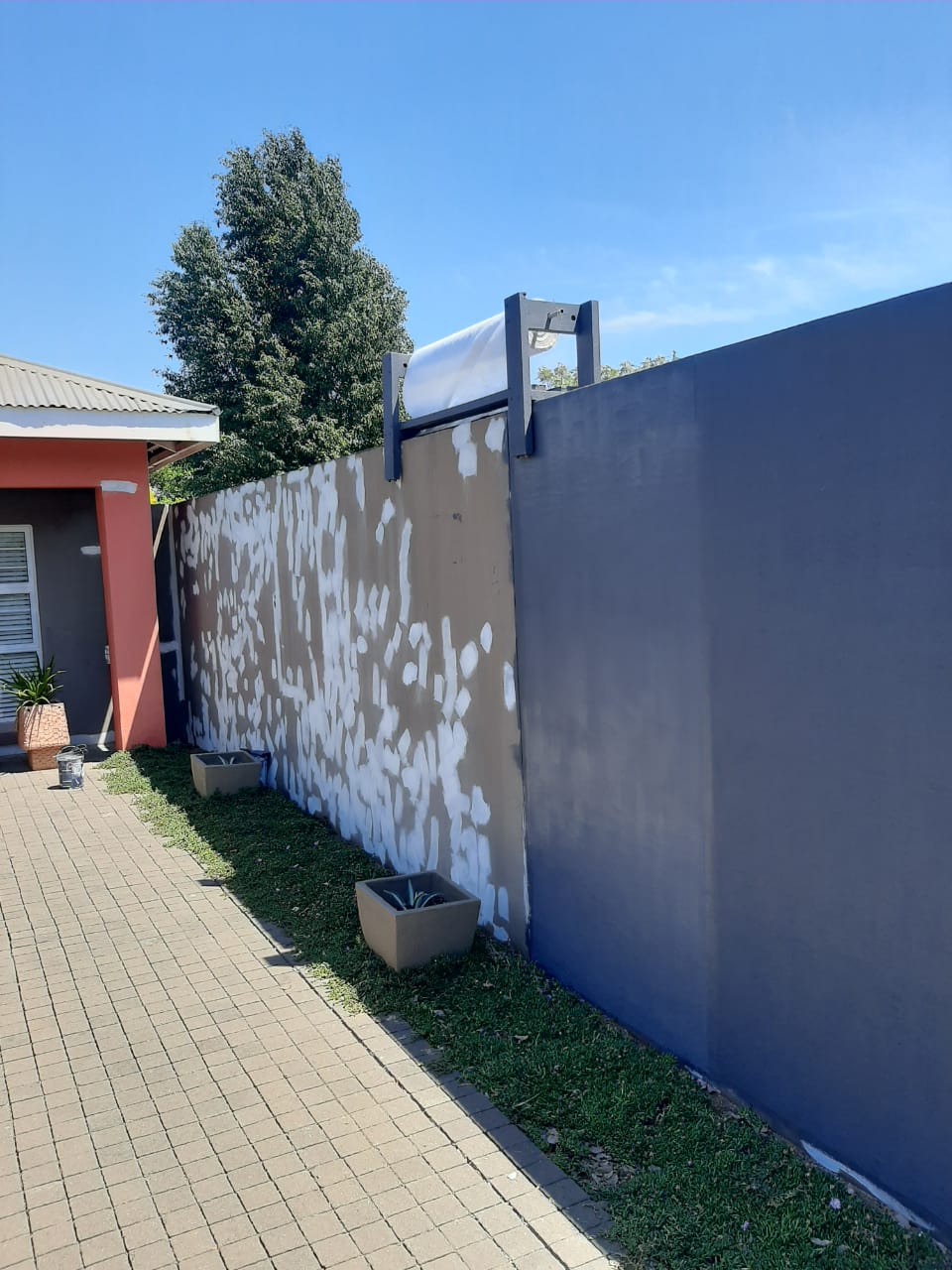 Wall being prepared for waterproofing treatment